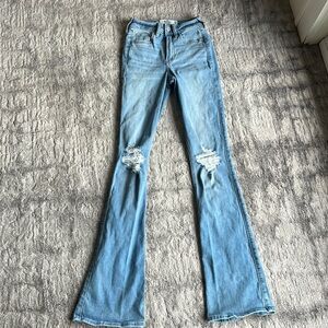 Hollister distressed boot cut jeans in light wash